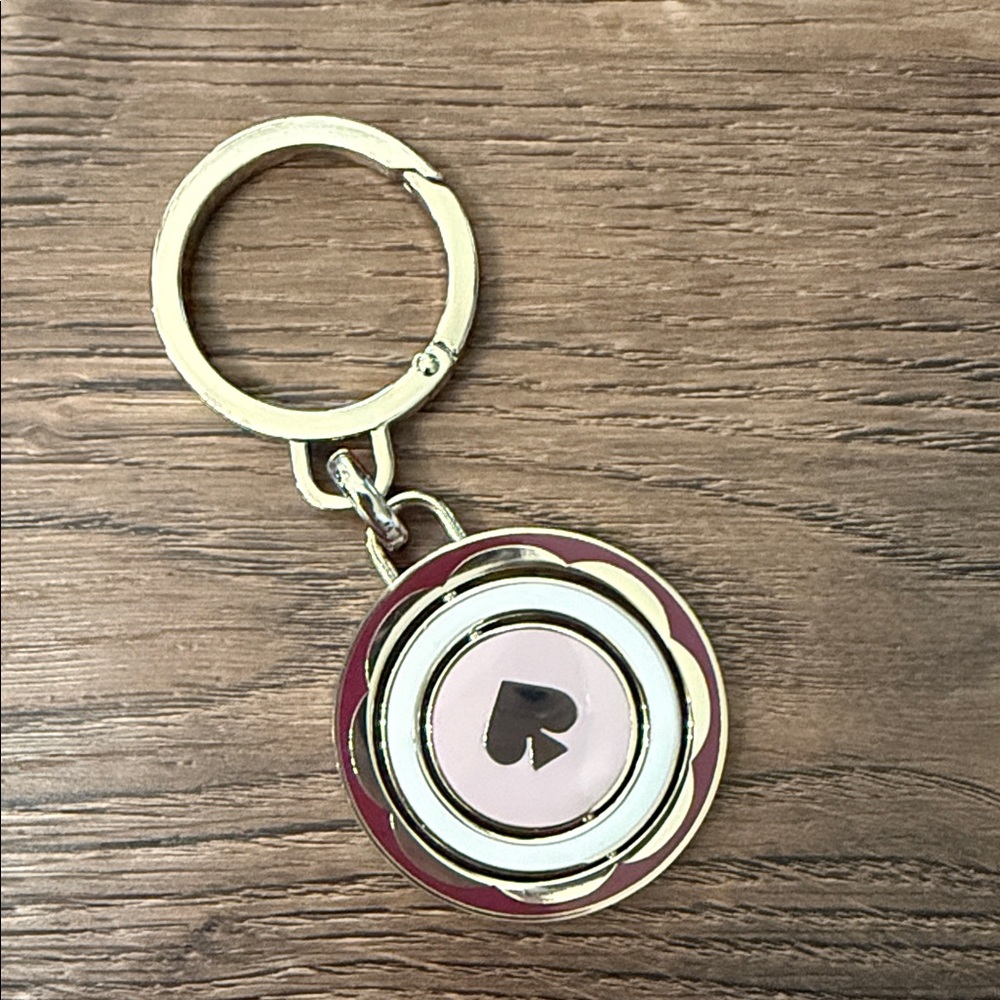 kate spade gold-tone keychain with pink and burgundy enamel